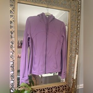 Like New Lululemon Hooded Define Jacket
Size 10
Mauve/Pale Purple Color
